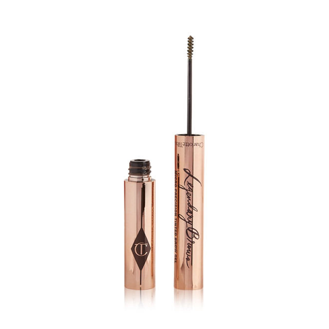 Open, tinted brow gel in a taupe shade with a thin brush for precision, and a shiny, gold-coloured tube.