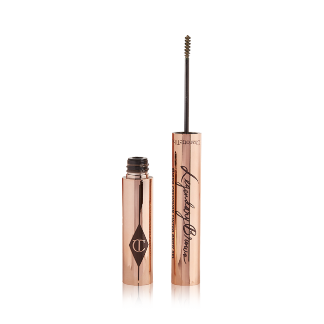 Open, tinted brow gel in a taupe shade with a thin brush for precision, and a shiny, gold-coloured tube.