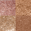 Swatches of four eyeshadows in matte and shimmery shades of peachy-pink, dusky rose, warm burgundy, and teal blue-brown.