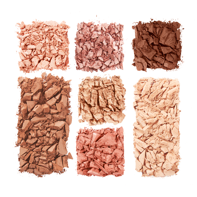 Swatches of a face palette that include three eyeshadows in beige, dusky pink, and dark brown shades, blush and highlighter in coral pink and honey-gold, and contour powders for light to medium skin tones.