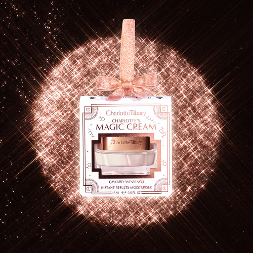 Charlotte's Magic Cream Bauble Mini packaging in a sparkle background