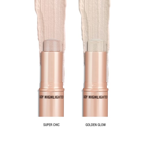 Two, open highlighter sticks in opal and soft grey-gold shades with golden-coloured tubes. 
