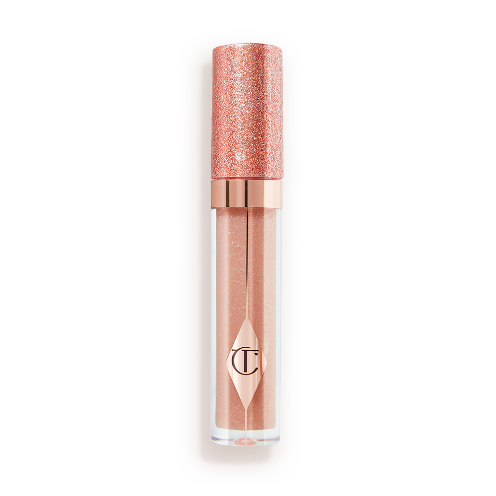 A shimmery lip gloss in a rosy champagne shade with fine glitter with a glittery lid. 