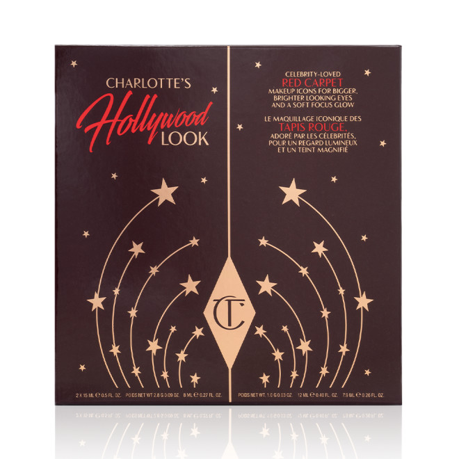 A dark-brown-coloured makeup gift box with stars printed on it in golden colour, along with the CT logo and the name of the kit, Charlotte's Hollywood Look' displayed on the top of the box.