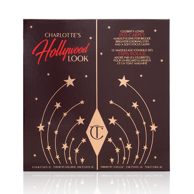 Charlotte's Hollywood Makeup Look box A dark-brown-coloured makeup gift box with stars printed on it in golden colour, along with the CT logo and the name of the kit, Charlotte's Hollywood Look' displayed on the top of the box.
