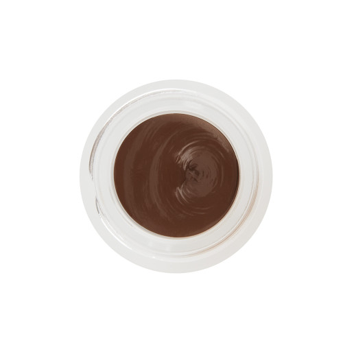 An open frosted glass pot with cream eyeshadow in a chocolate brown shade.