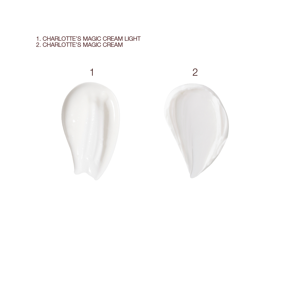 Swatches of a light, white-coloured face cream with a thick, pearly-white face cream. 