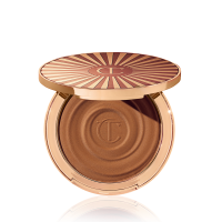 Open, cream bronzer compact in a medium-brown shade with gold-coloured packaging.