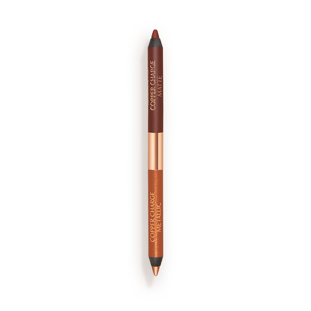 An open, double-ended eyeliner pen in warm rust and copper colours. 