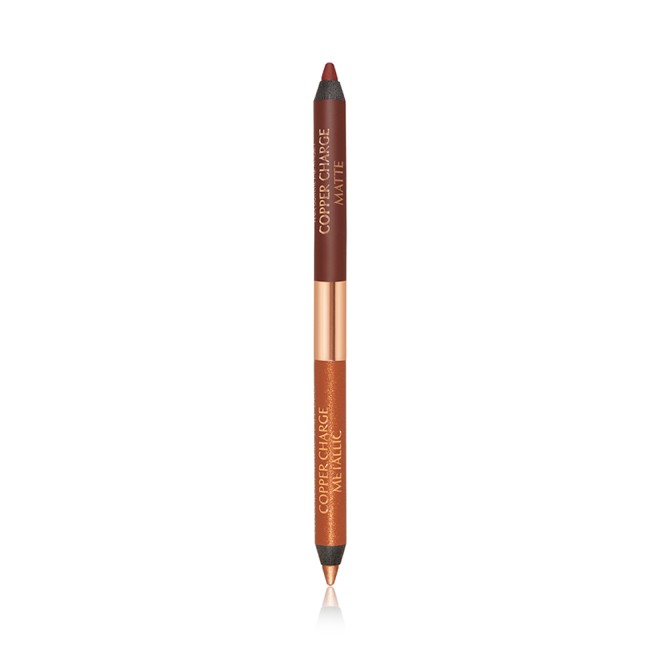 An open, double-ended eyeliner pen in warm rust and copper colours. 