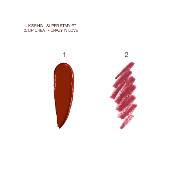 Swatches of a matte lipstick and lip liner pencil in a deep winter berry red shade.