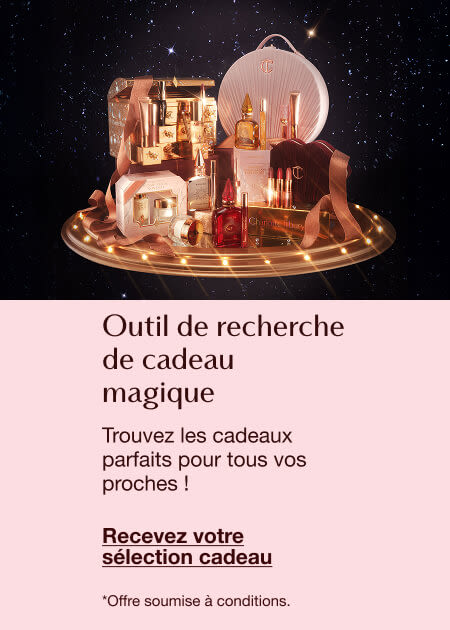 Magic Gift Finder featuring luxury beauty products on a lit circular platform with a magical, festive background and text inviting users to find perfect gifts.
