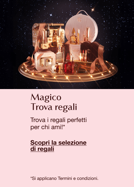Magic Gift Finder featuring luxury beauty products on a lit circular platform with a magical, festive background and text inviting users to find perfect gifts.