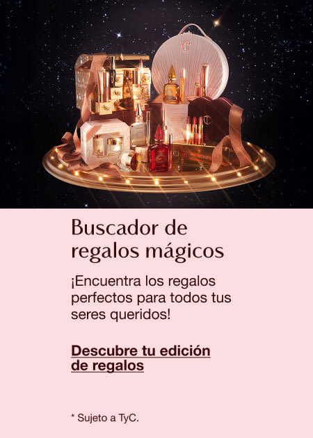 Magic Gift Finder featuring luxury beauty products on a lit circular platform with a magical, festive background and text inviting users to find perfect gifts.