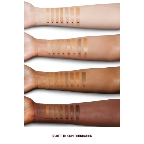 Fair, tan, and deep-tone arms with swatches of liquid foundations ranging from ivory, peach, and beige to sand, light brown, medium brown, and dark brown for fair, light, medium-light, medium, medium-dark, and deep tones.