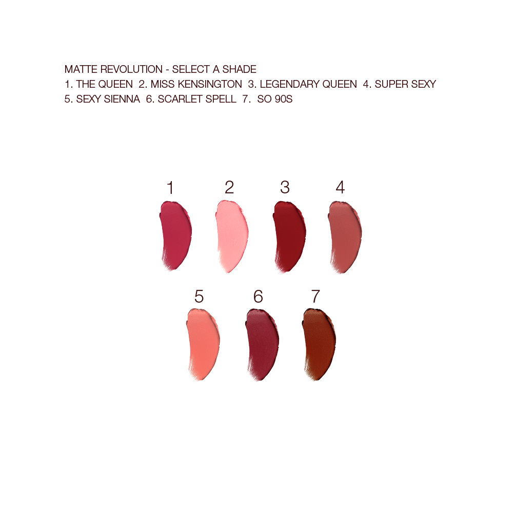 Swatches of seven lipsticks with a matte finish in shades of red, pink, peach, and brown.