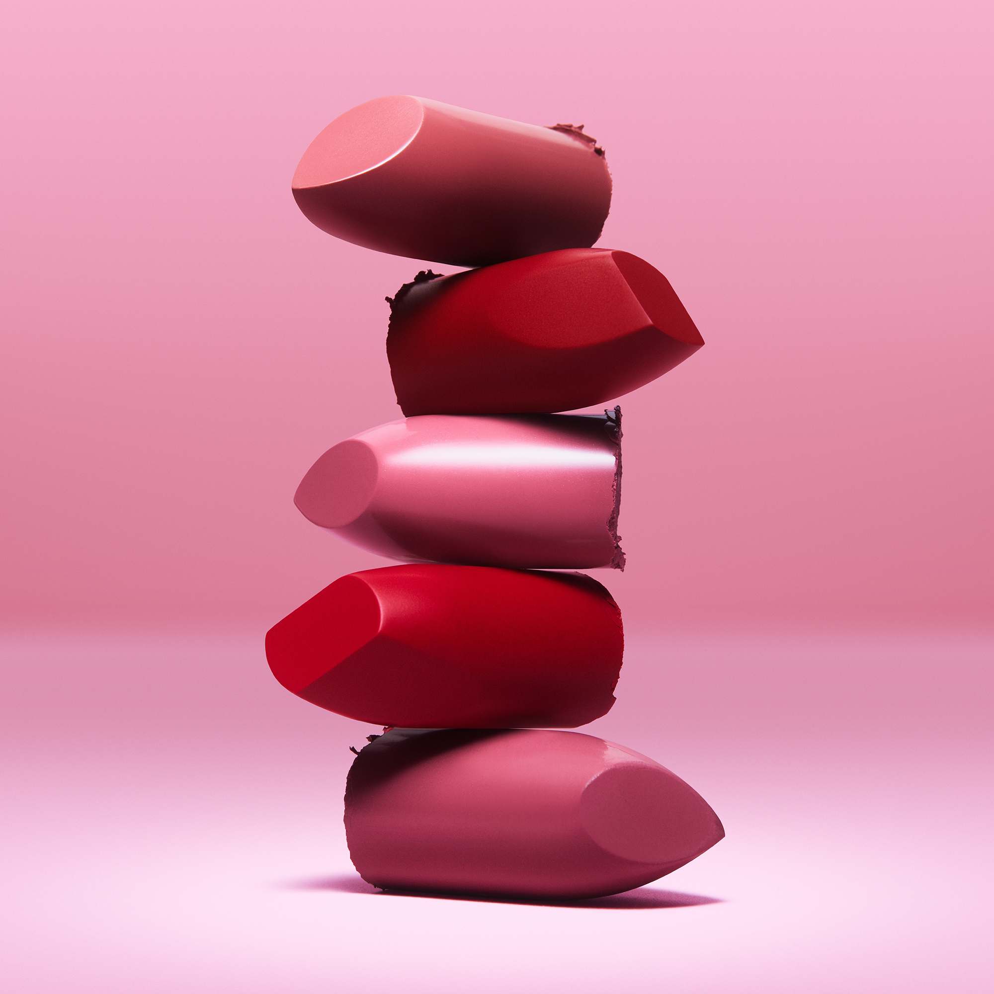 Pink and red lipstick bullets with matte and satin finishes