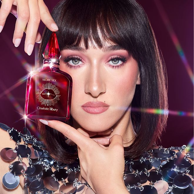 Bella Tilbury holding More Sex fragrance Bella Tilbury holding More Sex fragrance