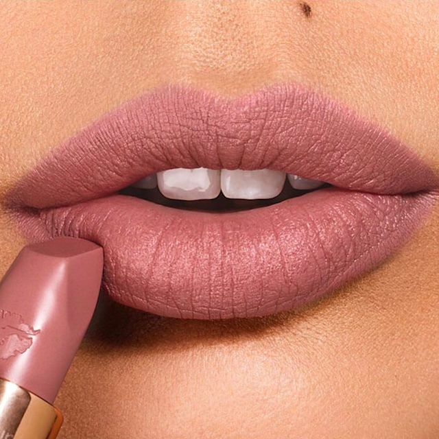 Model wearing Pillow Talk and Very Victoria lip liner and lipstick combination