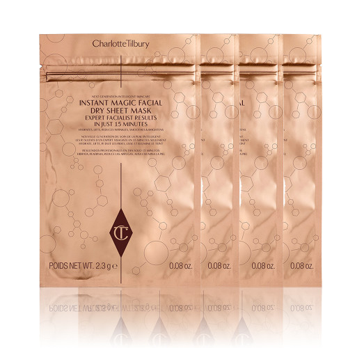 A collection of sheet masks in gold-coloured foil packaging.