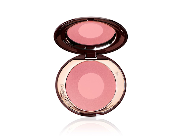 An open, mirrored-lid two-tone blush in warm pink and light peach-pink. 