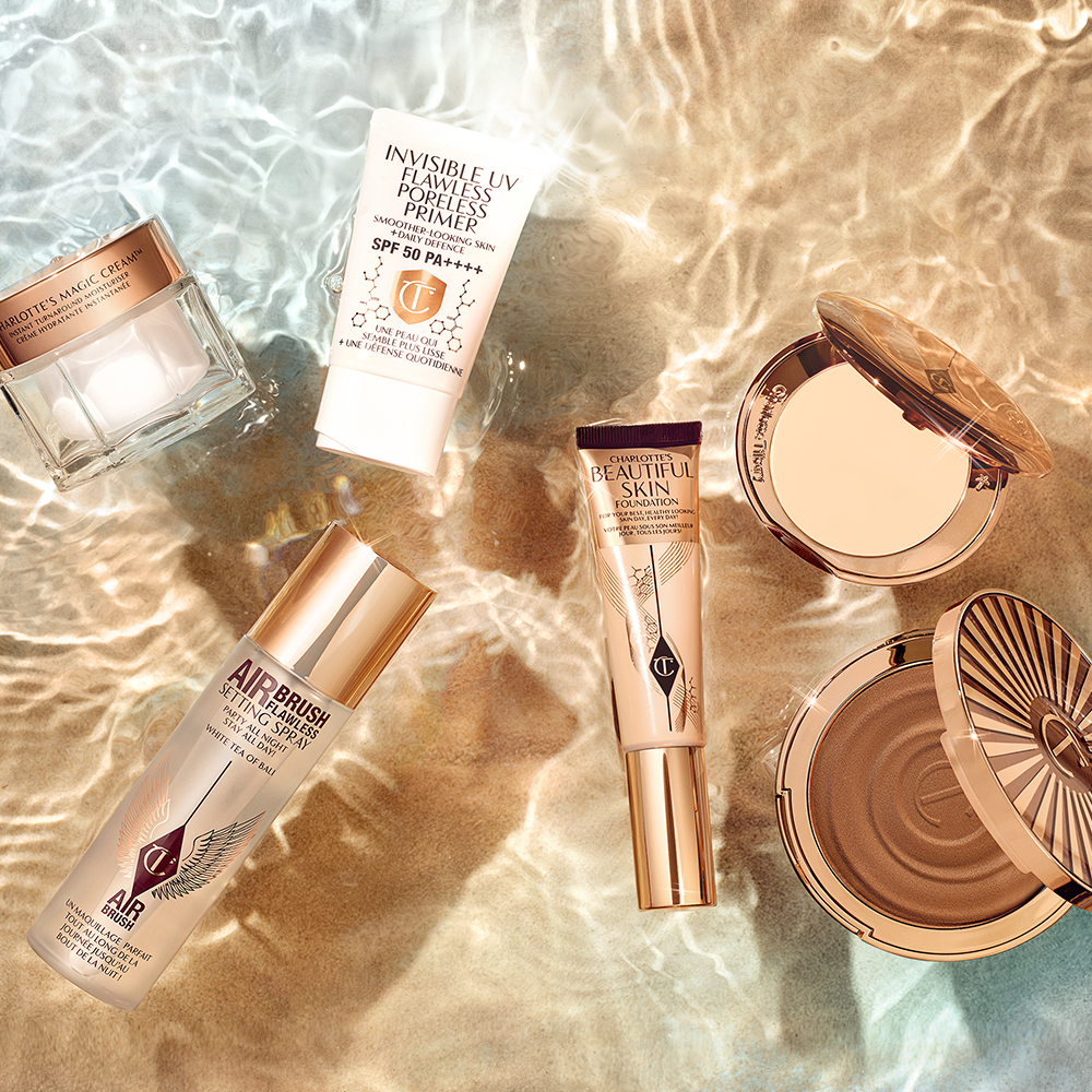 Beach wedding makeup essentials including Airbrush Flawless Finish pressed powder and Airbrush Flawless Setting Spray