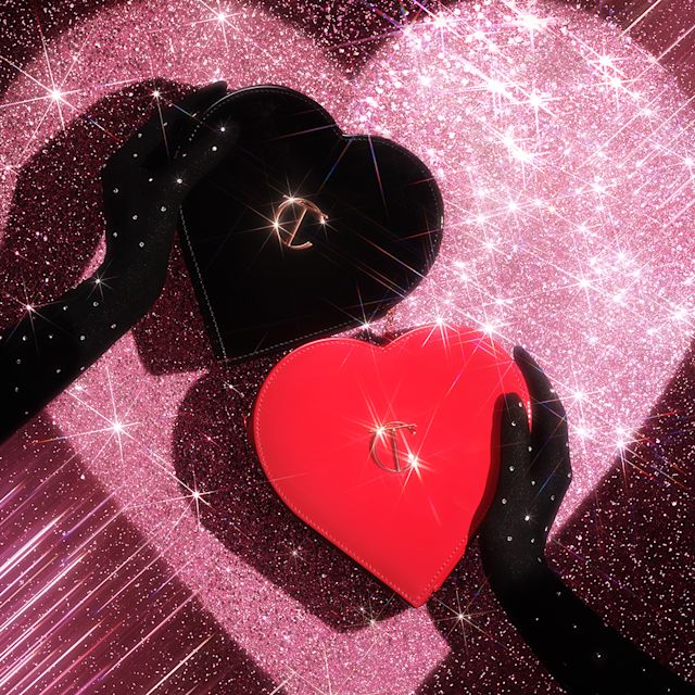 Heart shaped makeup bag in red and black colourways
