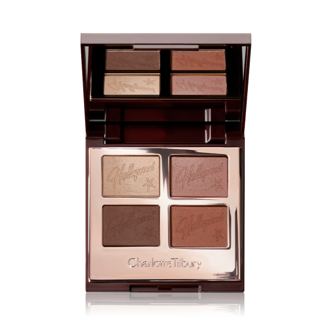 An open, quad eyeshadow palette in matte and shimmery shades in gold, amber, chocolate brown, and terracotta eyeshadows.