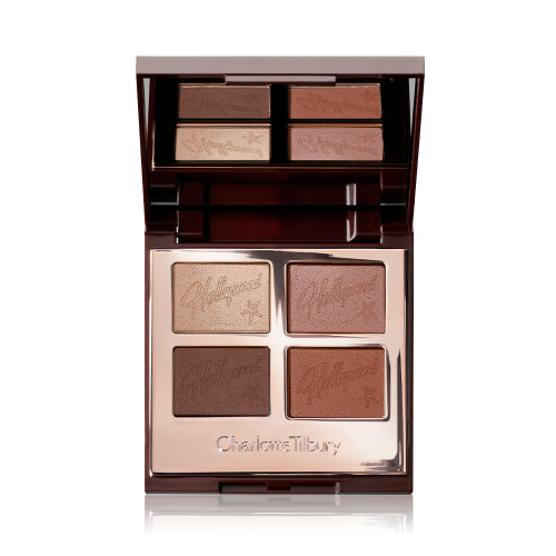 An open, quad eyeshadow palette in matte and shimmery shades in gold, amber, chocolate brown, and terracotta eyeshadows.