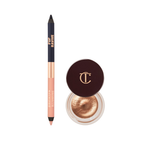 A double-sided eyeliner pencil in jet black and nude beige with an open eyeshadow pot filled with nude cream eyeshadow with fine shimmer.