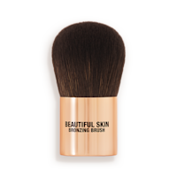 A bronzer brush with soft, dark brown synthetic bristles and a golden-coloured handle, perfect for both cream and powder bronzers. 