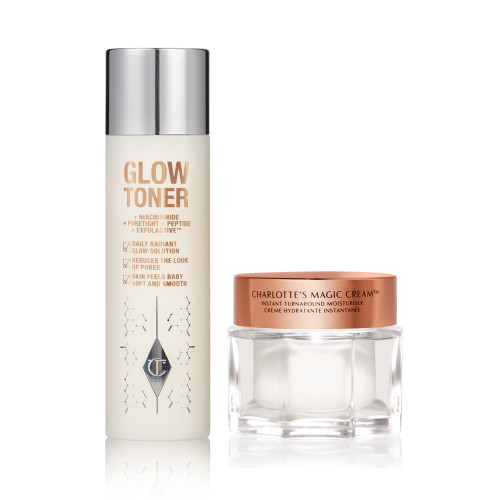 Toner in a large, clear bottle with a silver-coloured lid and pearly-white face cream in a glass jar with a rose-gold-coloured lid. 