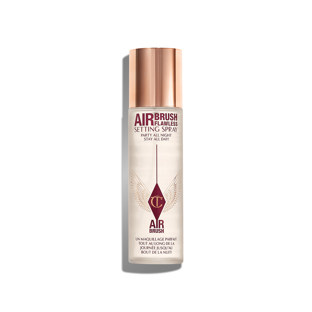 Charlotte Tilbury Airbrush Flawless Setting Spray bottle with a 'Best Seller' badge.
