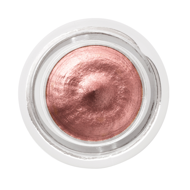 Cream eyeshadow in an open glass pot in a nude pink shade with fine shimmer.