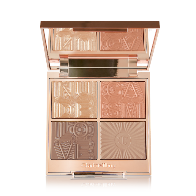 An open face palette with a mirrored lid with a reflective fawn eyeshadow that can be used as a highlighter, dark brown-peach blush, and a contour and eyeshadow duo in brown shades.