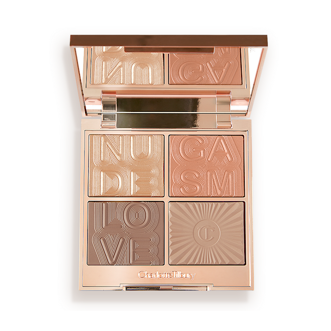 Glowgasm face palette in Nudegasm open An open face palette with a mirrored lid with a reflective fawn eyeshadow that can be used as a highlighter, dark brown-peach blush, and a contour and eyeshadow duo in brown shades.