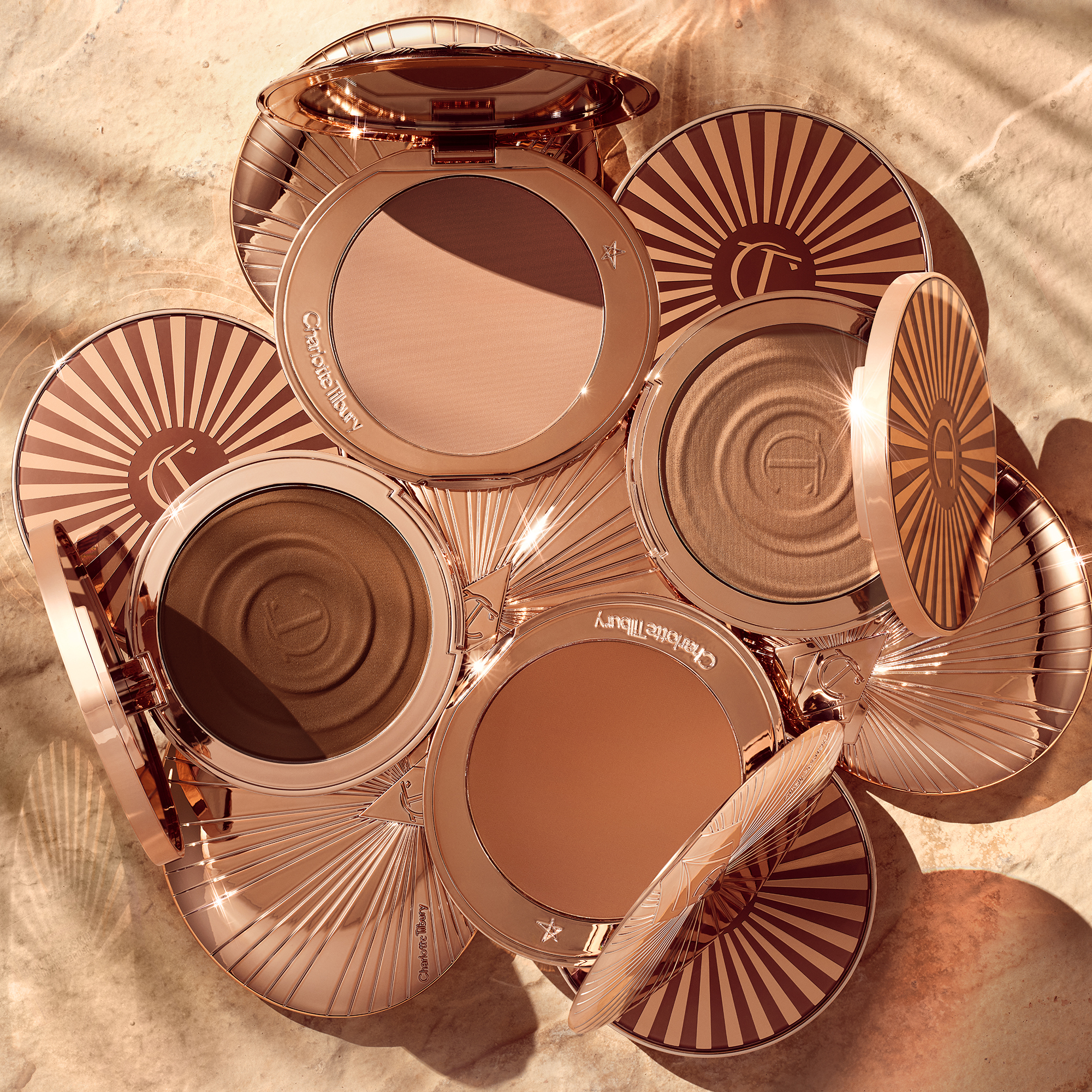 Charlotte's Bronzer Wardrobe_Airbrush Bronzer and Beautiful Skin Sun-Kissed Glow Bronzer_Still Life