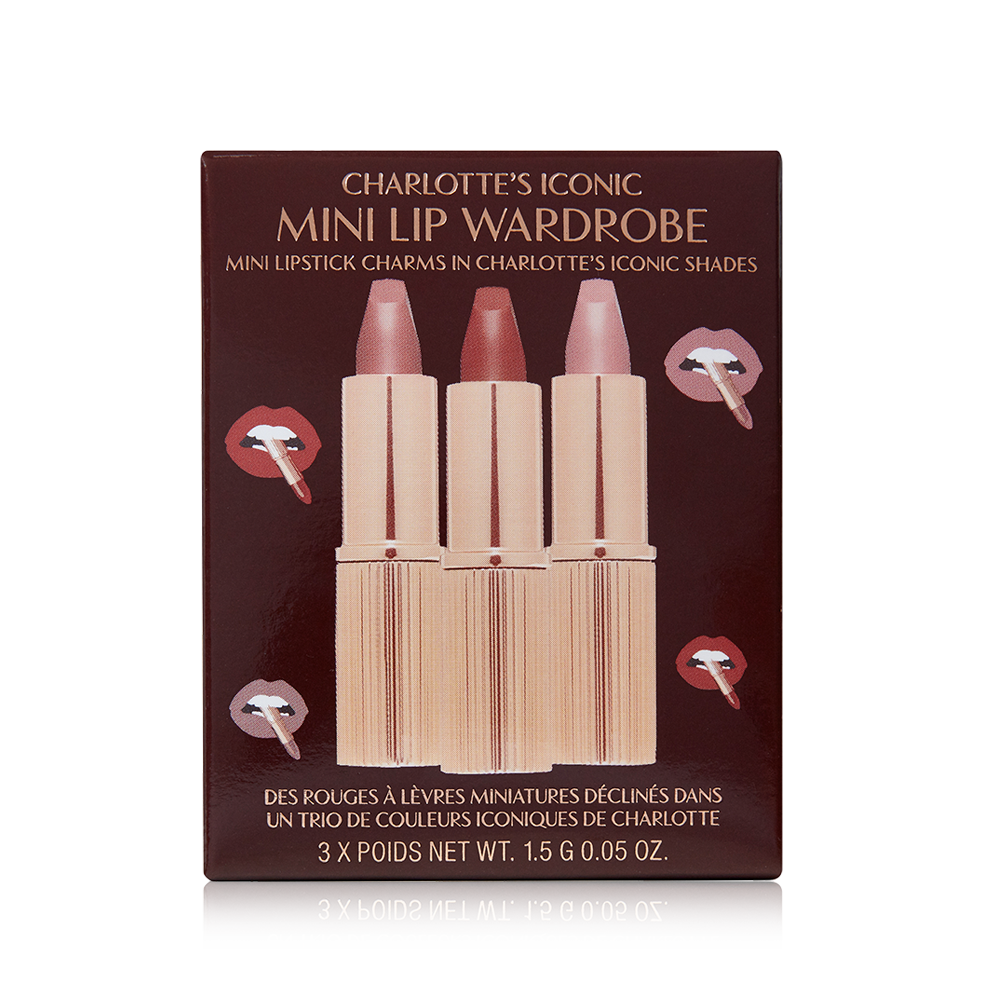 A dark brown coloured-box with three lipsticks inside in nude pink, pale pink, and berry-rose. 