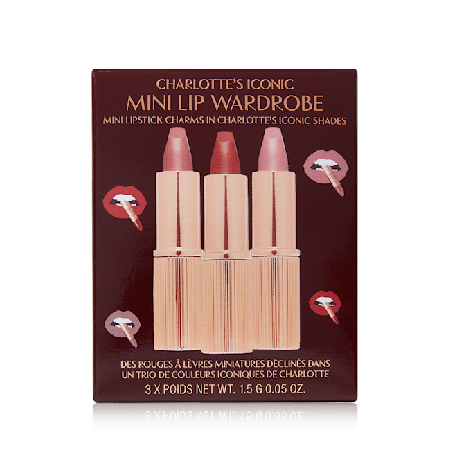 Charlotte's Iconic Mini Lip Wardrobe packed A dark brown coloured-box with three lipsticks inside in nude pink, pale pink, and berry-rose.