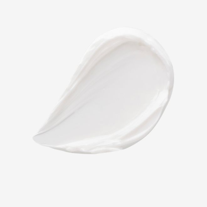 Magic Cream swatch Swatch of a pearly-white face cream.