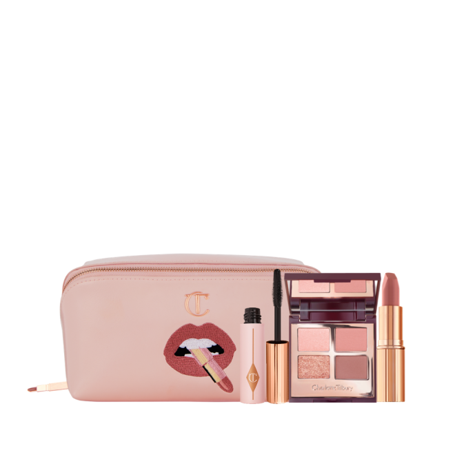 a pink makeup bag, mini black mascara, pink eyeshadow quad and rose pink lipstick