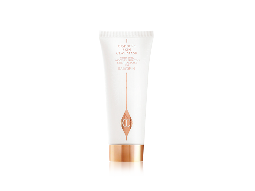 A clay mask in a white and rose-gold colour scheme with the CT logo printed on the front. 