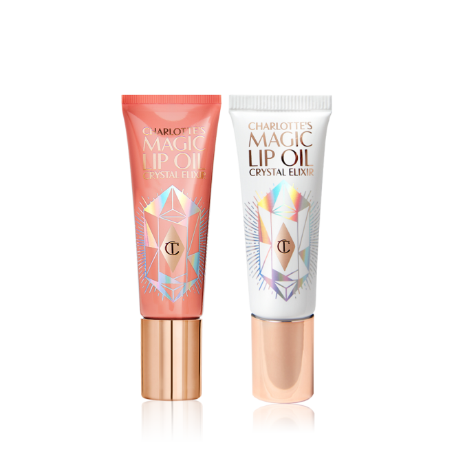 two closed lip oils in a white-coloured tube with a gold-coloured lid and coral-coloured tube with gold-coloured lid. 