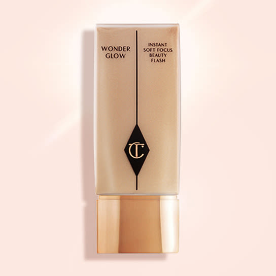 Wonderglow skin tint and makeup primer on light pink background