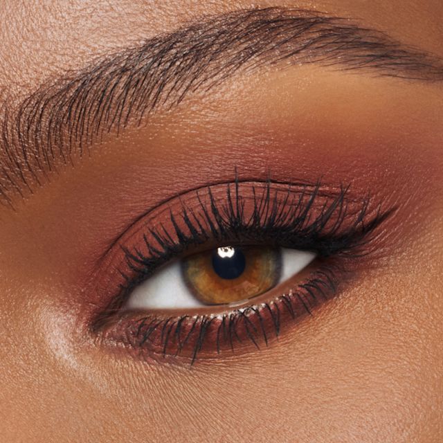 Cocoa Cherry Sculpt eyeshadow stick used as a cream eyeshadow base