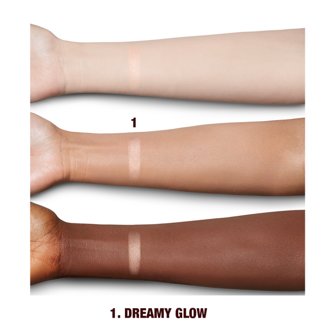 Fair, tan, and deep-tone arms with swatch of a glowy light rose-gold powder highlighter. 