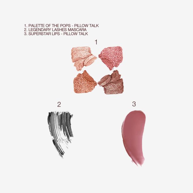 Palette of Pops in Pillow Talk, Superstar Lips in Pillow Talk, and Legendary Lashes Mascara Bundle swatches Swatches of four shimmery eyeshadows in champagne, copper, pink, and brown, a jet-black mascara, and a berry-pink lipstick.