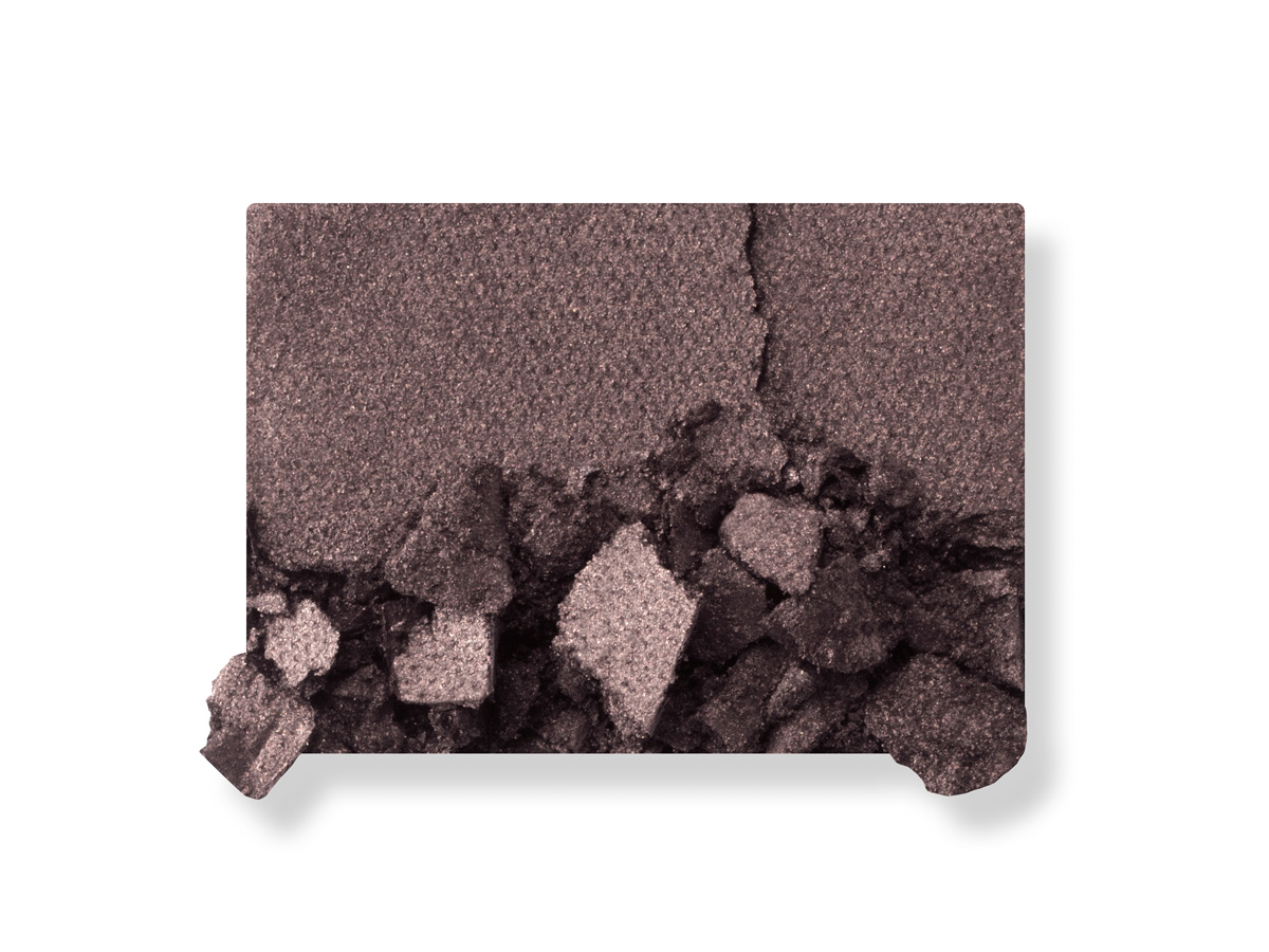 Swatch of a powder eyeshadow in a smokey silver-grey shade. 