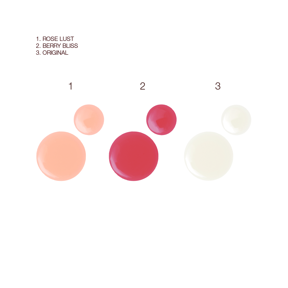 Swatches of three, high-shine sheer lip oils in pale pink, berry-rose shades, and clear shades. 