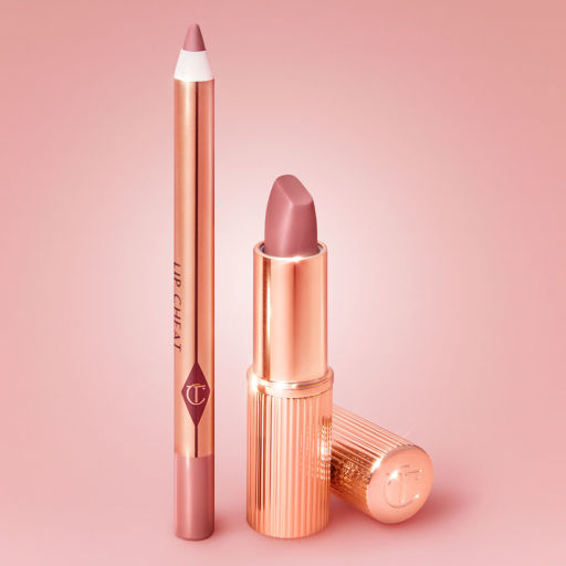 An open lip liner pencil and an open matte lipstick in soft, nude pink colour with shiny, golden-coloured packaging. 